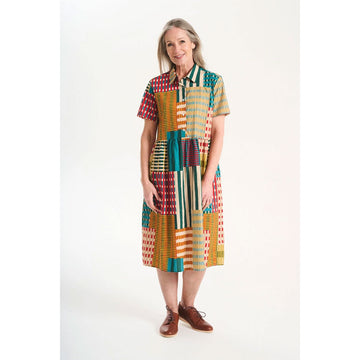 Colorful patterned dress on a white background.