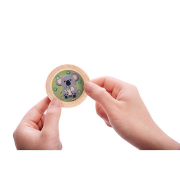 Two small round wooden puzzle mazes, illustrated with a koala and kangaroo each and silver balls in the maze holes.