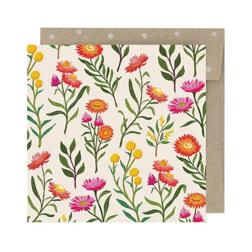 Floral patterned card with a brown envelope on a white background.