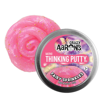 A silver tin with the heading 'Crazy Aarons Mini Thinking Putty Fairy Sprinkles' with pink putty behind.
