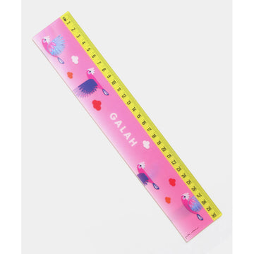A ruler with moving images of galahs against a pink background.