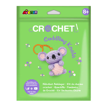 Crochet kit packaging for a Cuddling Koala with green background and Avenir branding.