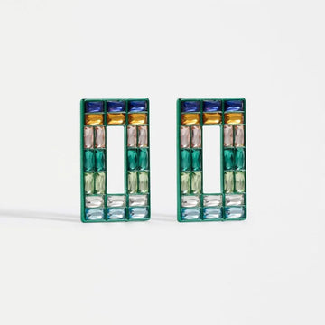 Pair of earrings with colorful rectangular stones on a white background