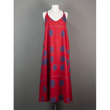 Front view of a red dress with blue circular patterns on a mannequin against a gray background.