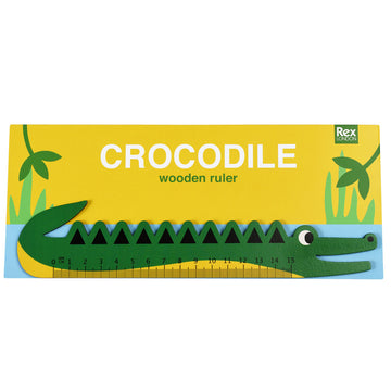 A green and yellow ruler in the shape of a crocodile.