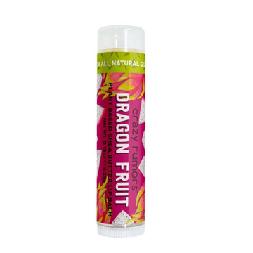 A tube of lip balm with the text 'Dragon Fruit' on the front with images of dragon fruits on a purple label.