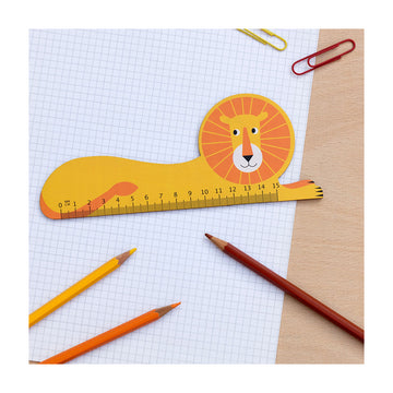 A 15 cm lion shaped ruler coloured orange.