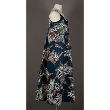 Front view of a patterned dress on a mannequin against a plain background