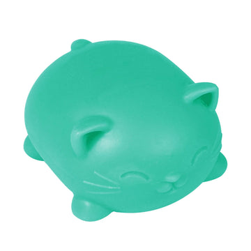 A green cat shaped stress ball inside a box with cut outs and the text 'Nee Doh Cool Cats' written on the top and front.