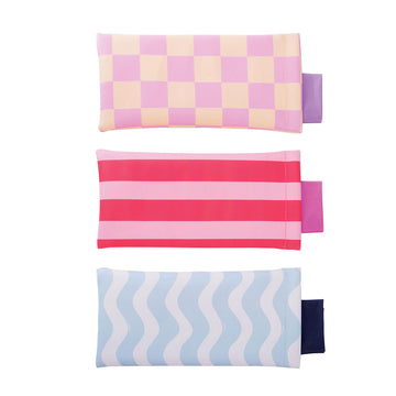 Three glasses cases each with a different pattern and colour on them.