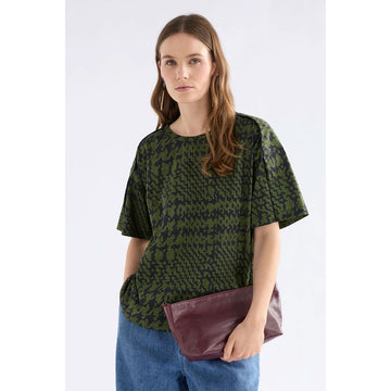 Green patterned shirt on a white background.