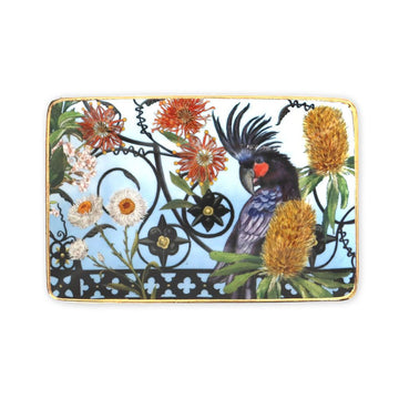 Decorative trinket tray with a parrot and floral design on a white background