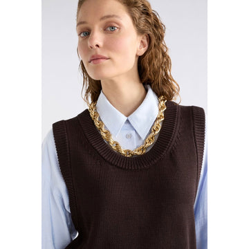 Gold chain necklace on a white background.