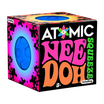 A cube box with the text 'Atomic Nee Doh Squeeze' on the front and cut outs on the top and side showing the ball inside.