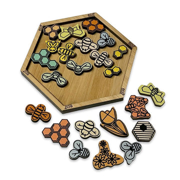 A hexagon shaped puzzle in a brown box with the heading 'Bumble Jumble Pack It In Puzzle'.
