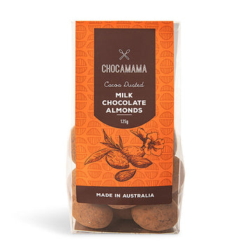 A clear bag filled with chocolate covered almonds and an orange product label attached to the bag.