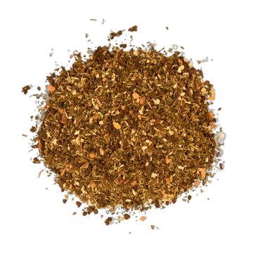 An orange box with white writing and vanilla sticks, mint and orange in the bottom corner.