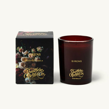 Scented candle and packaging with 'Southern Wild Co' branding on a white background.
