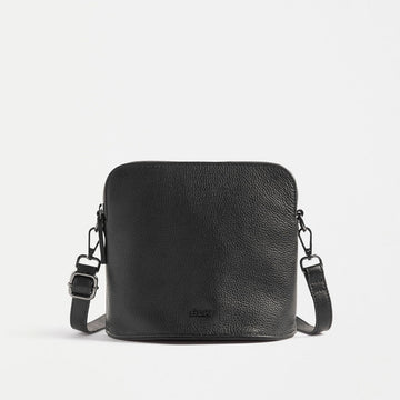 Front view of a cross body bag in black with matching detachable straps and the ELK logo visible.