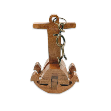 A wooden puzzle in the shape of an anchor with a metal chain attached inside a box titled 'Chain + Anchor'.