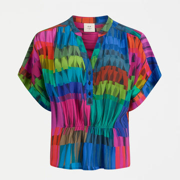 Colorful patterned blouse on a white background.