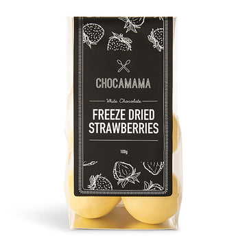 A clear bag filled with white chocolate covered strawberries with a black product label attached.