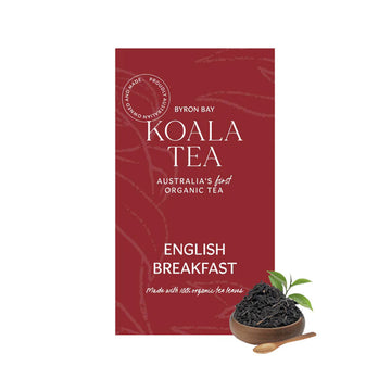 Amaroon bo with white writing and a bowl with loose leaf tea in the bottom right corner next to a wooden spoon.