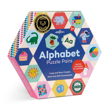 A hexagon shaped box titled 'Alphabet Puzzle Pairs' with illustrations of different objects around the border including a dinosaur, cake and yo-yo.