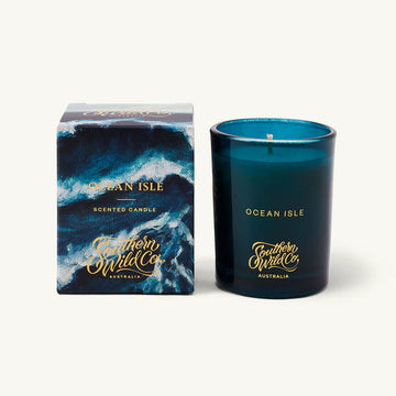 Ocean Isle scented candle with packaging by Southern Wild Co on a white background.