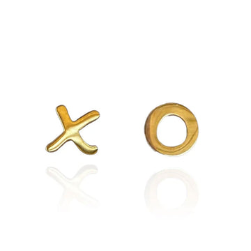 A pair of gold stud earrings, one shaped like an x and the other shaped like an o.