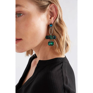 Pair of earrings with green and blue gemstones on a white background.