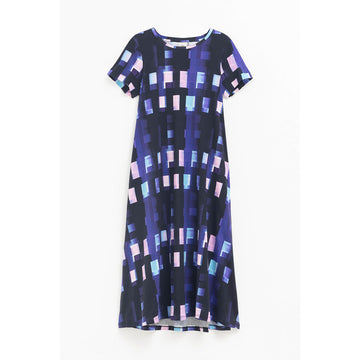 A tshirt dress printed with a geometric square pattern in dark blue, black and light pink and blue.