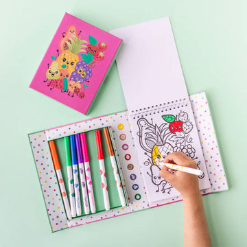 Front cover of a pink box titled 'Scented Colouring Fruity Cutie'  with illustrations of fruits and sweets with smiley faces.