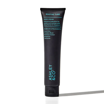 A black tube filled with handcream and the heading 'Soothe Tube' followed by product information.