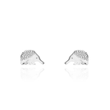 A pair of silver stud earrings shaped like echidnas.