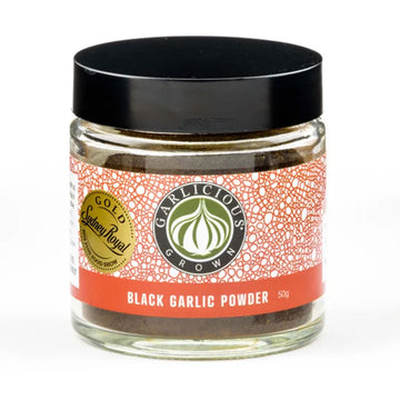 A clear jar with a wide product label and the title 'Black Garlic Powder'.