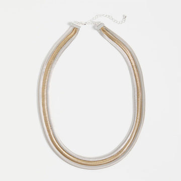 Necklace with two-tone design on a white background.
