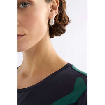 Gold hoop earrings on a white background