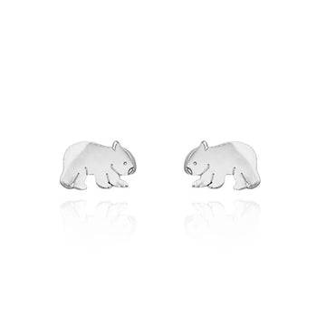 A pair of silver stud earrings shaped like wombats.
