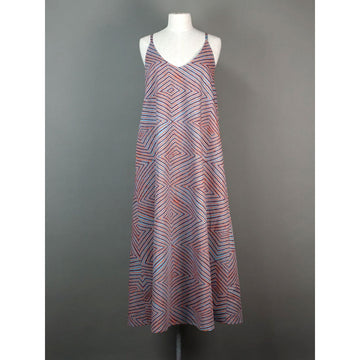 Front view of a patterned dress on a mannequin against a gray background.