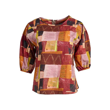 A women's blouse printed with a red and pink rectangle pattern.