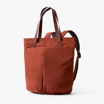 Brown tote bag with brown straps on a white background