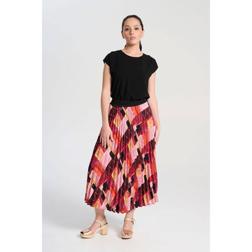 A pleated skirt printed with a red and pink pattern and black waistband.