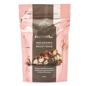 A pink packet with the heading 'Nutworks Macadamia Rocky Road' and a photo of two pieces of rocky road chocolate.