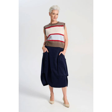 A navy corduroy skirt with side pockets and side tucks.