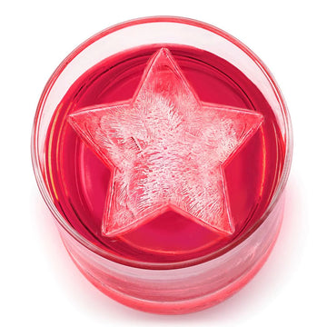 A silicone tray with star shaped moulds and a white information sleeve around it