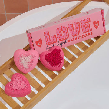 A pink rectangle box with the heading 'Love Heart Shaped Bath Fizzers'.