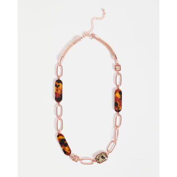Necklace with tortoiseshell and rose gold links on a white background.