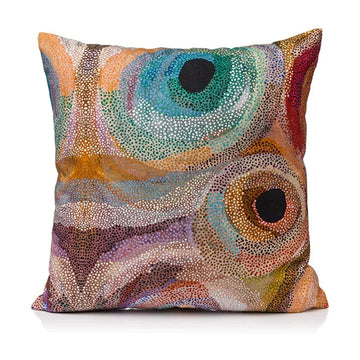 A square cushion printed with artwork by Marianne Burton.