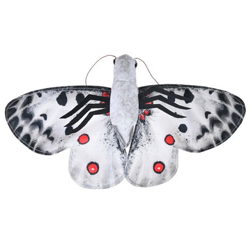 A butterfly shaped soft toy in grey, black and red.